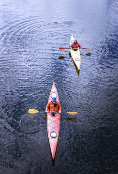 Traveling by kayak on the river on a sunny day.