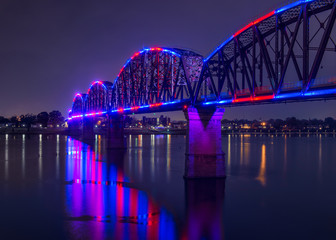 Big Four Bridge across the Ohio River in Louisville, Kentucky at night