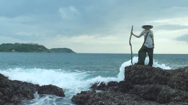 Traveler Woman On Coast With Cloudy Sky Background