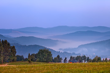 Piękny wschód słońca w górskim mieście Muszyna. Beautiful sunrise  in the mountain in Muszyna - Poland. Polish mountain landscape. © rogozinski