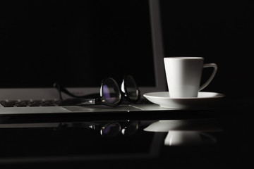 Office desk table with coffee cup.