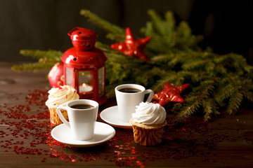 Christmas decoration with candle in lantern and fir tree on wood