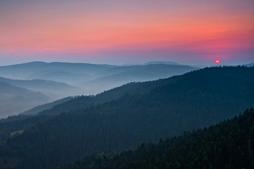 Piękny wschód słońca w górskim mieście Muszyna. Beautiful sunrise  in the mountain in Muszyna - Poland. Polish mountain landscape.