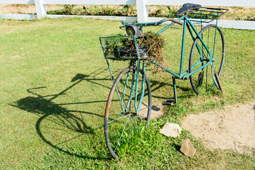 Fototapeta na wymiar Vintage bike on grass with shadow