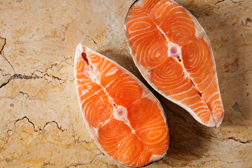 salmon steak on natural marble table