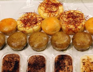 desserts with cheese and aromatic spices on sale at the italian