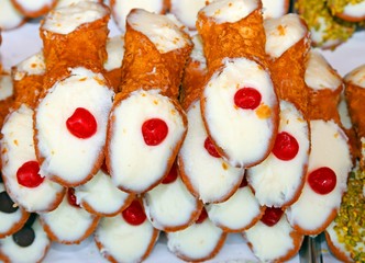 typical Sicilian pastries called CANNOLI with cherry