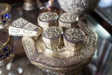 antique Asian silverware (soft focus)