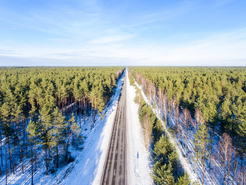 Infinity road in winter scenery photographed by drone