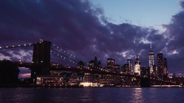 NYC Timelapse. Brooklyn Bridge landscape time lapse at sunset. New York City time lapse.