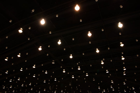 Exhibition hall with ceiling lights background