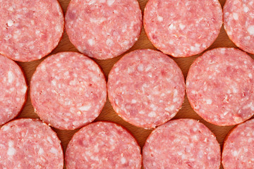Sliced pieces of smoked salami sausage