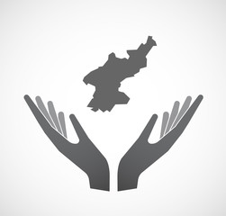 Isolated hands offering  the map of North Korea