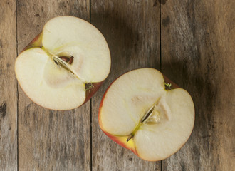 red apples on wooden table, selective focus