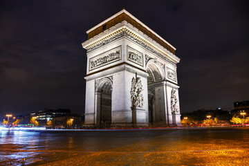 Naklejka premium The Triumphal Arch (Arc de Triomphe) in Paris, France