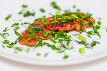 Fried pork schnitzel with greens