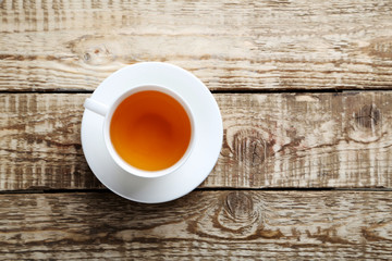 Cup of tea on a grey wooden table