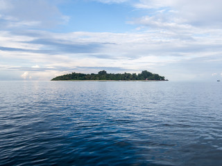 Isolated island on the horizon
