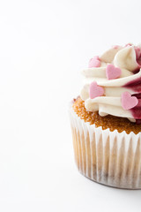 Valentine cupcake decorated with sweet hearts isolated on white background.copyspace

