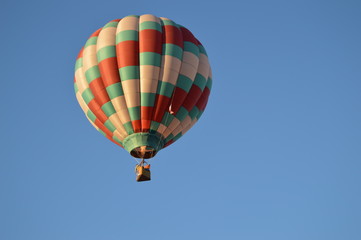 Naklejka premium Hot air balloon in flight