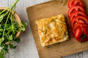 Su Boregi / Turkish Patty with tomatoes and greens.