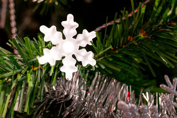 Lighted snowflake on the Christmas tree