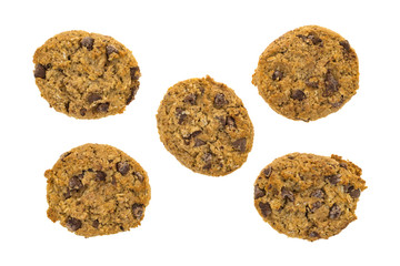Oatmeal chocolate chip cookies top view isolated on a white background.