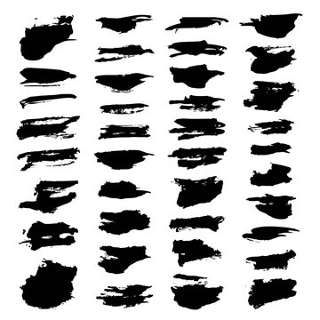 Abstract black textured strokes paint set isolated on a white background