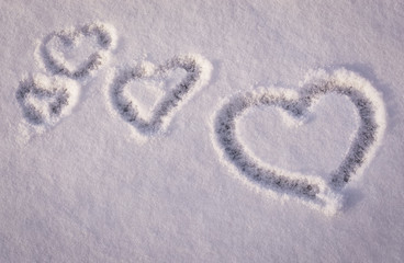 hearts drawing on the snow, with place for text