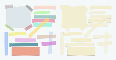 Multiple pieces of colorful and beige sticky tape in different shapes on white background - 131131063