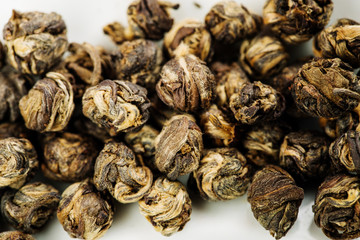 Tea balls closeup. Chinese Dragon pearl