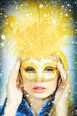 Pretty girl in carnival mask