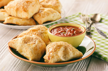 Puff pastries with meat (samosa) - traditional uzbek and indian pastry.