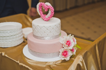 Sweet cake decorated with pink hearts and flowers 6764.