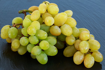 grapes on a black background