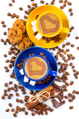 Cup of coffee and beans with delicious macaroon on a white backg
