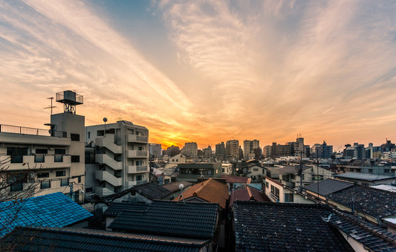 Sunset over buildings in Tokyo