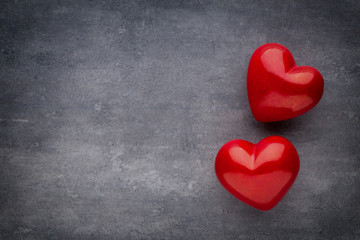 Red heart on the gray background.