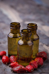 Dog rose essential oil on small bottles