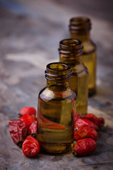 Dog rose essential oil on small bottles