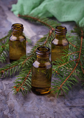 Fir tree essential oil in small bottles