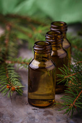 Fir tree essential oil in small bottles