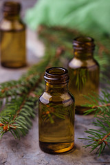 Fir tree essential oil in small bottles