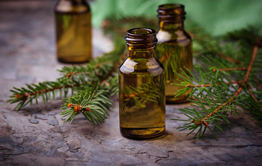 Fir tree essential oil in small bottles