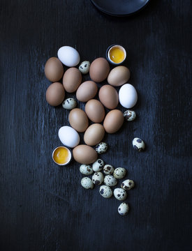 Assorted whole and cracked eggs 
