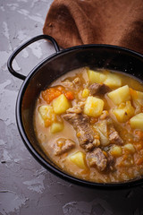 Stewed beef with potatoes, carrot and pumpkin