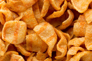 Delicious potato chips closeup becon meat.
