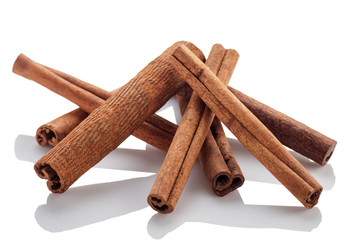 Cinnamon sticks on a white background
