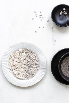 Black and white ingredients and plates 