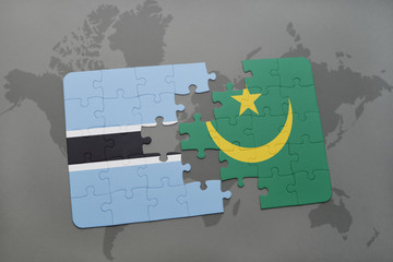 puzzle with the national flag of botswana and mauritania on a world map